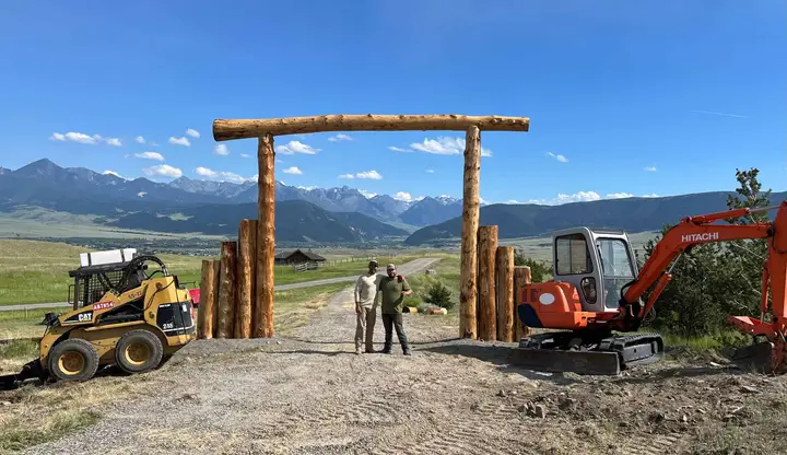 Square milled beam archway with a stained finish.