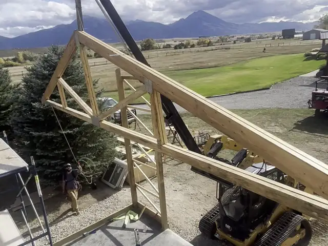 Pole barn trusses and purlins going up