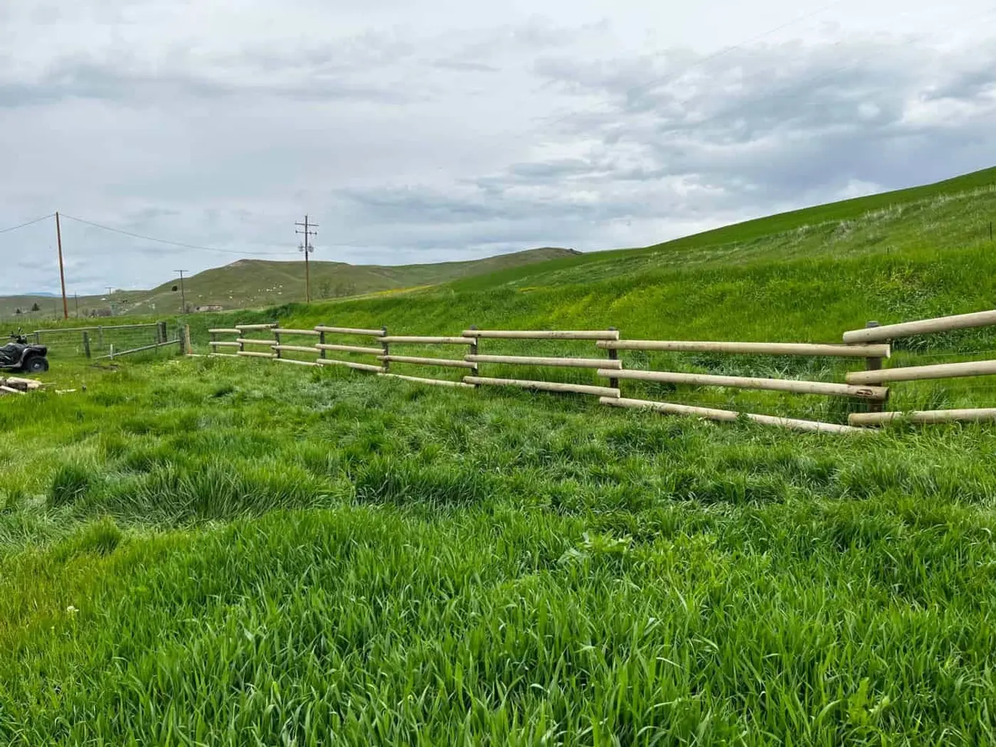 Rural Montana property with fencing and rolling pasture