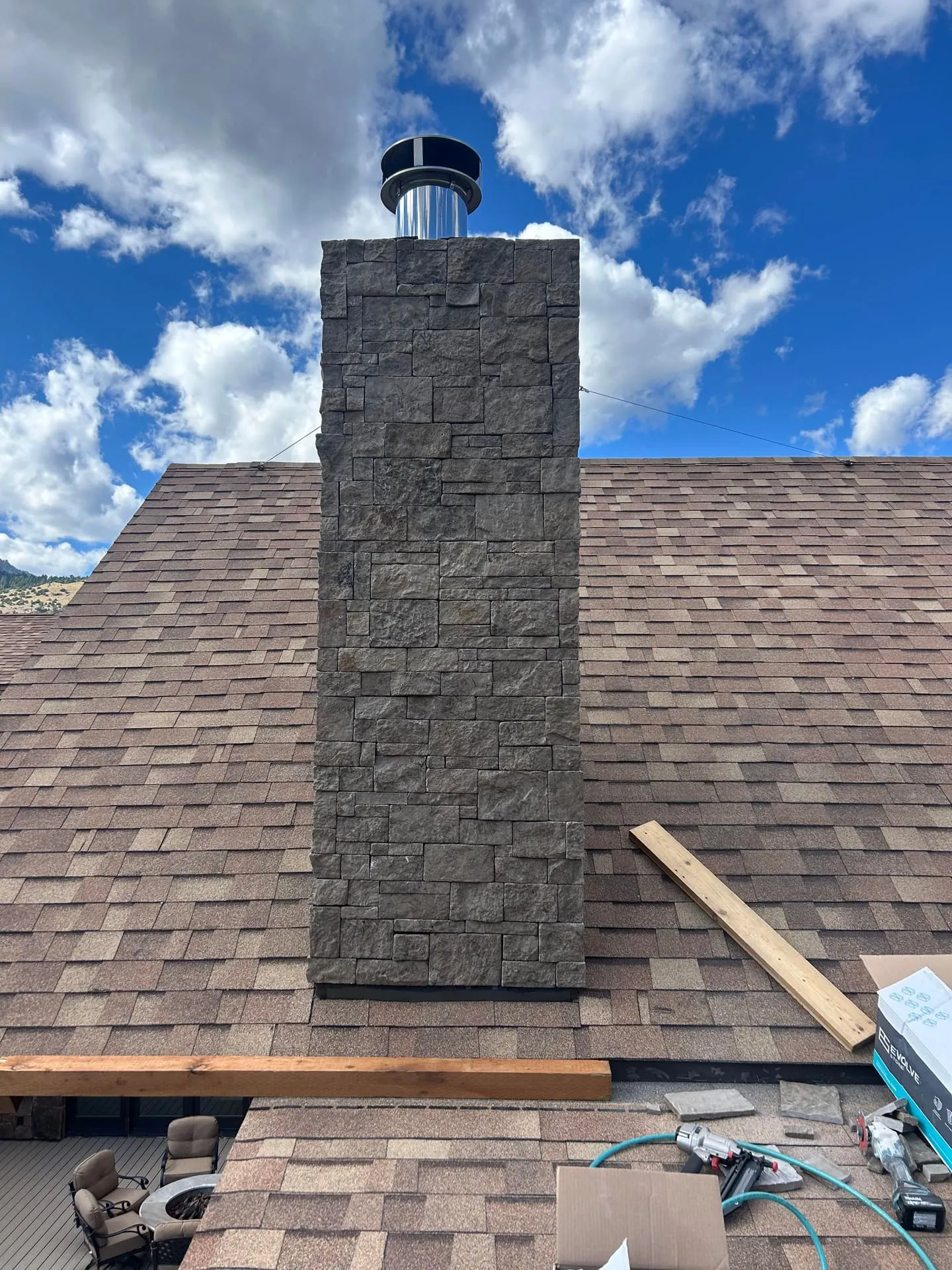 Stone veneer installation on a Montana chimney